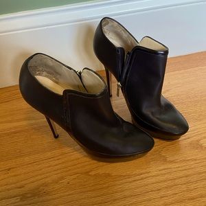 Jimmy Choo booties. 5 inch heel. Black matte leather with glossy leather detail.